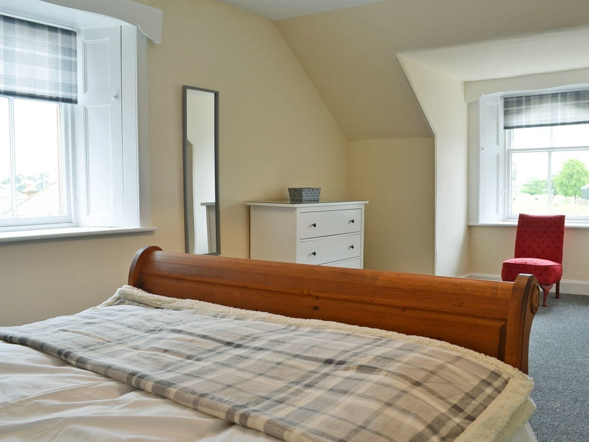 Relaxing double bedroom with sleigh bed | Halleaths Home Farm, Lochmaben