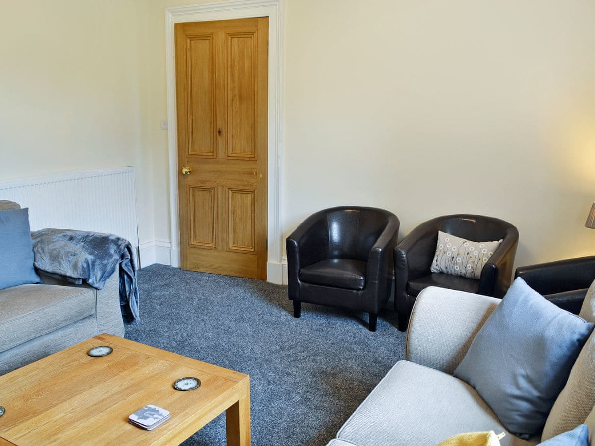 Light and airy living room with open fire | Halleaths Home Farm, Lochmaben
